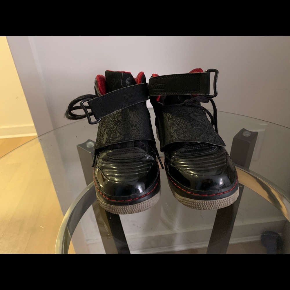 Black and red Jordans, high top, very comfortable
